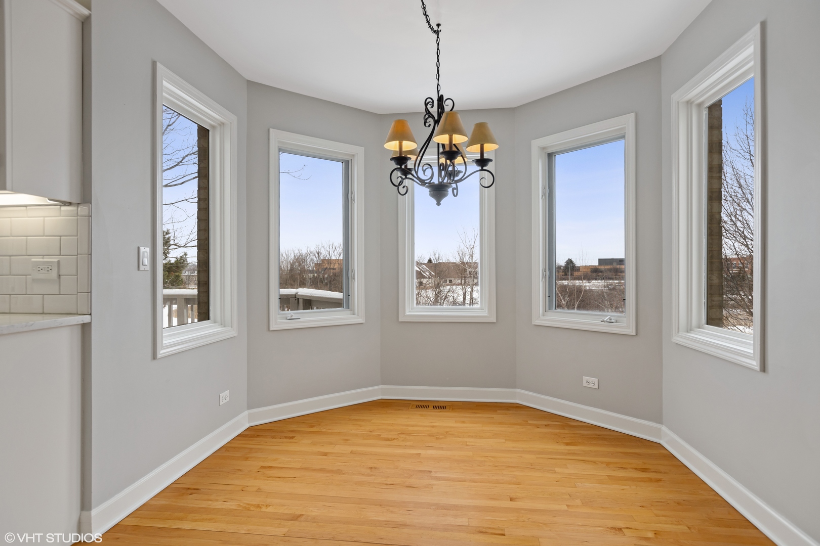 1909 Cornell Drive New Lenox, IL 60451 - Photo 9 of 26 a view of an empty room with a window and chandelier