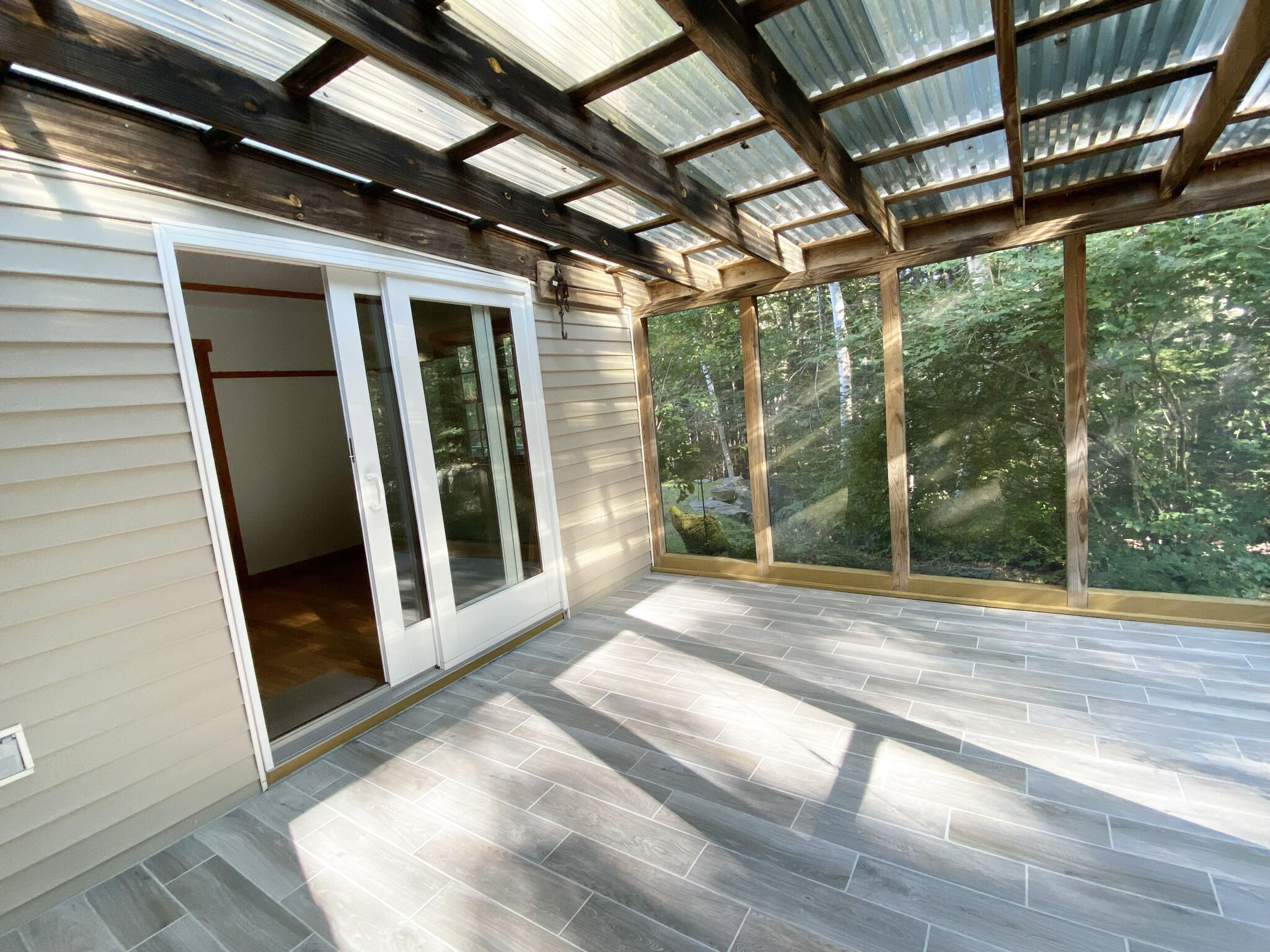 910 Castine Road Orland, ME 04472 - Photo 14 of 47 Screened patio & slider to DR