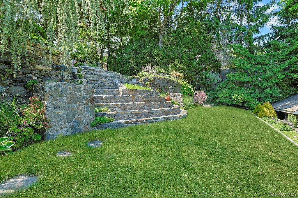 97 Underhill Road Scarsdale, NY 10583 - Photo 26 of 39 a view of garden with trees
