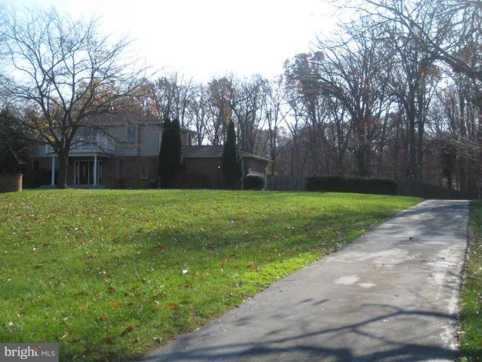 7906 Woodyard Road Clinton, MD 20735 - Photo 20 of 21 Driveway leaving to house