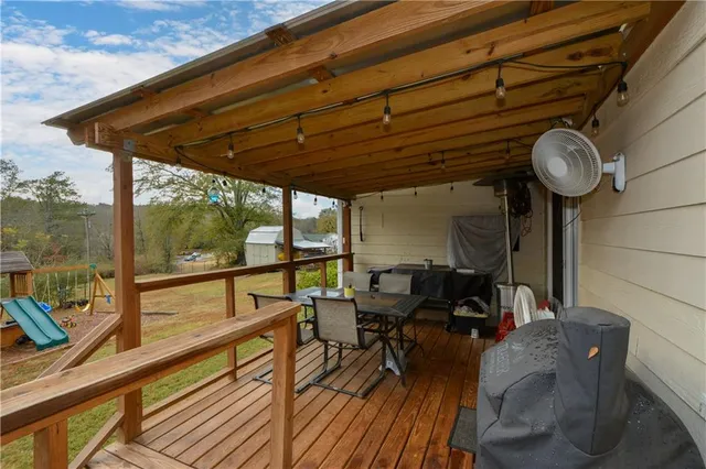 a view of chairs and table in balcony