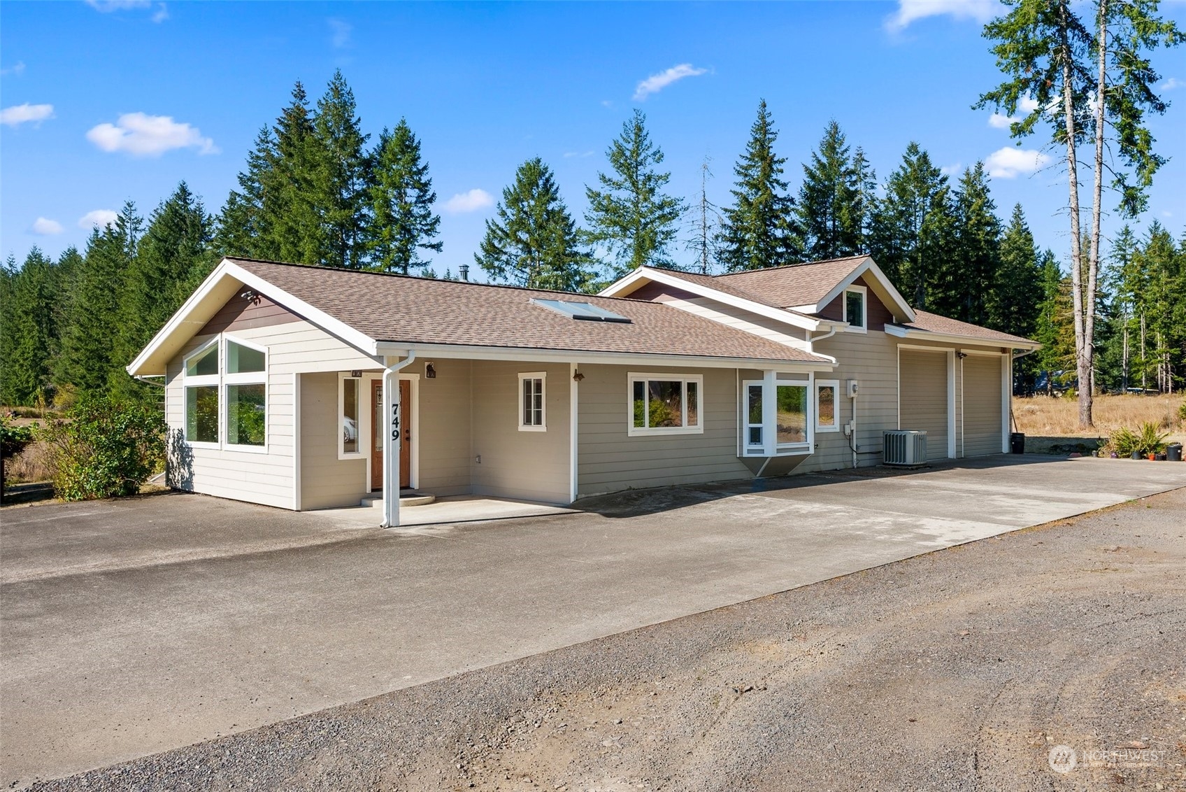 749 Logan Hill Road Chehalis, WA 98532 - Photo 2 of 36 a front view of a house with a garden