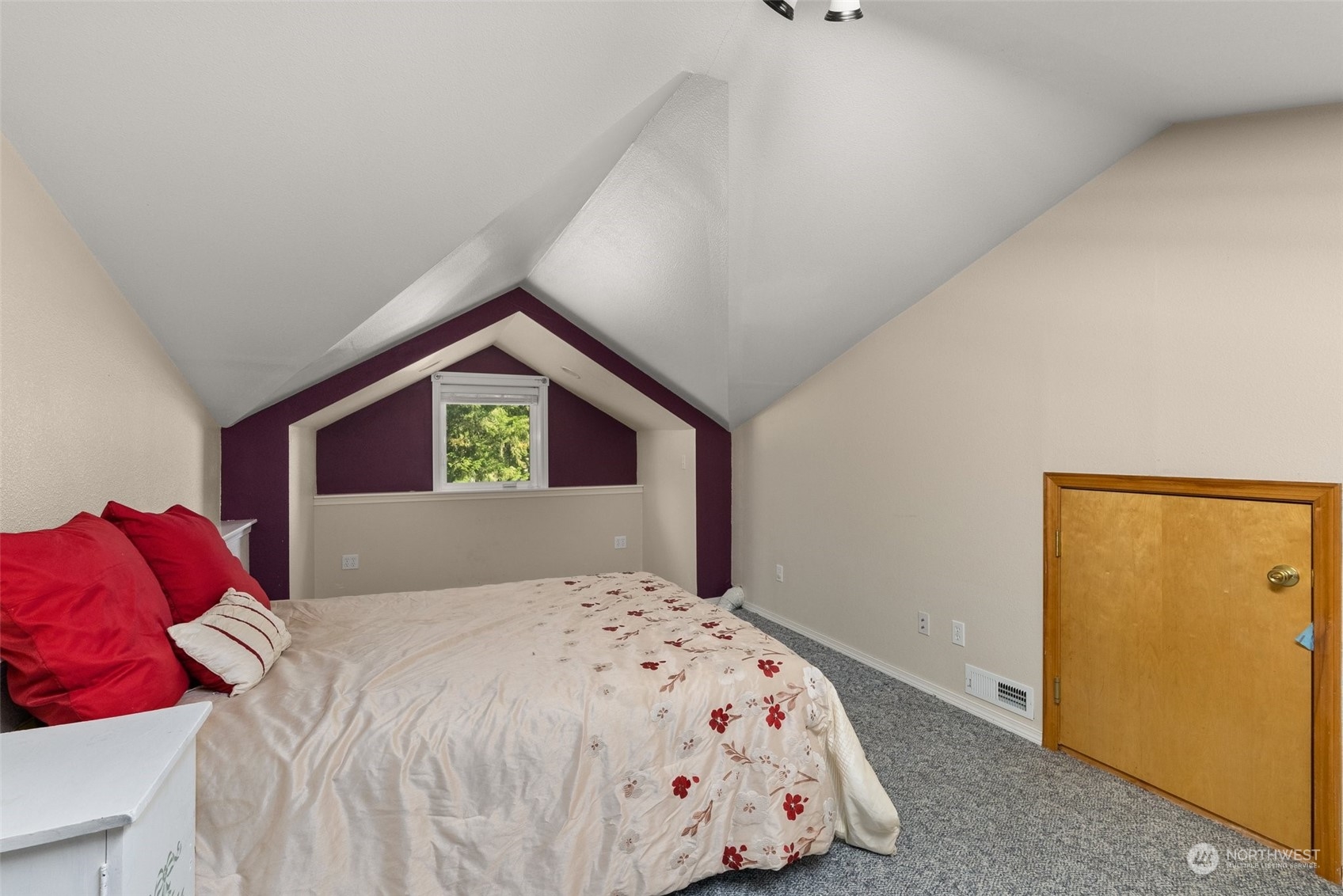 749 Logan Hill Road Chehalis, WA 98532 - Photo 23 of 36 a bedroom with a bed and a painting on the wall