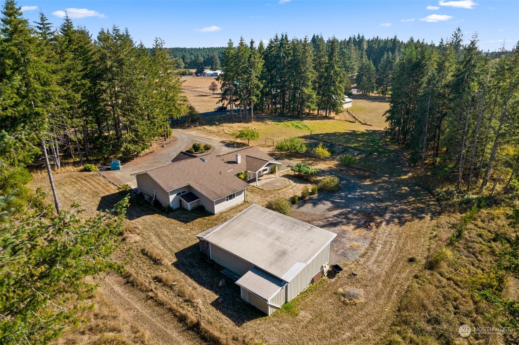 749 Logan Hill Road Chehalis, WA 98532 - Photo 34 of 36 a view of a house with yard and mountain view