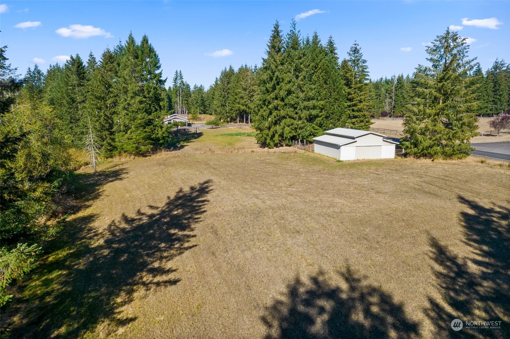 749 Logan Hill Road Chehalis, WA 98532 - Photo 7 of 36 a view of a plants and trees in the background