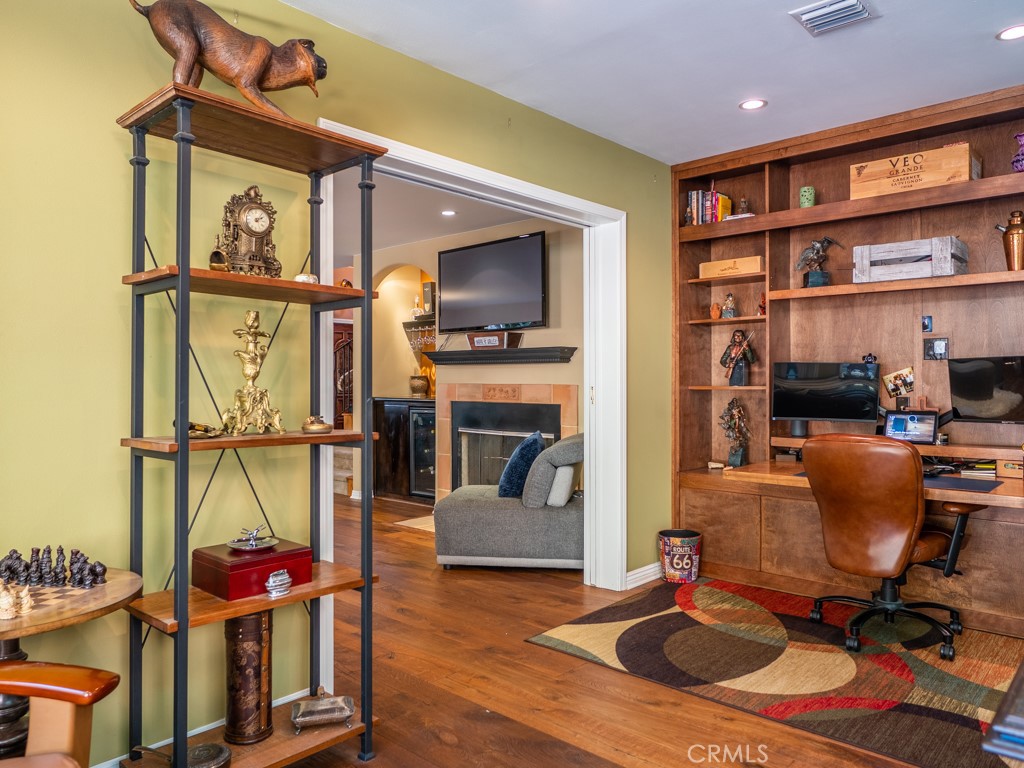 1934 Pasadena Glen Road Pasadena, CA 91107 - Photo 14 of 38 a living room with furniture a flat screen tv and a table