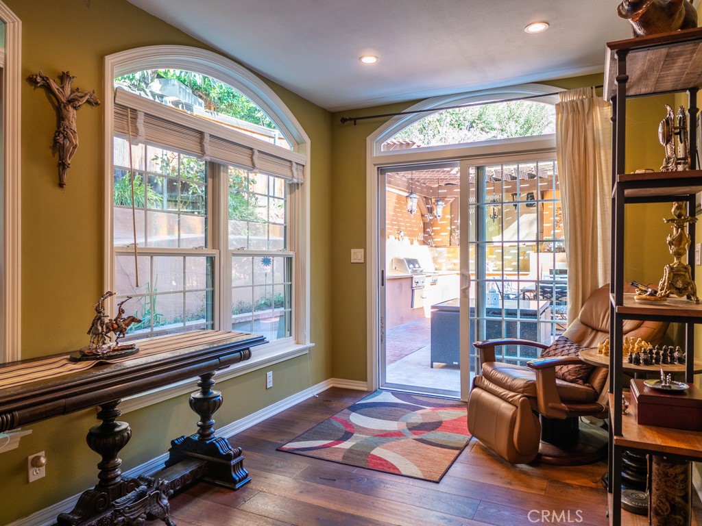 1934 Pasadena Glen Road Pasadena, CA 91107 - Photo 15 of 38 a living room with furniture and a floor to ceiling window