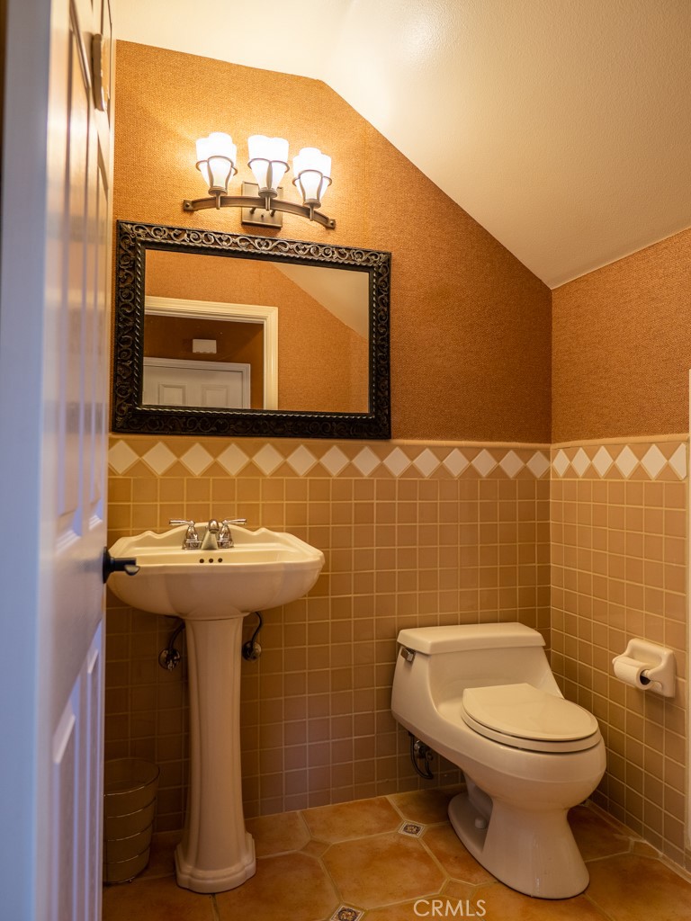 1934 Pasadena Glen Road Pasadena, CA 91107 - Photo 16 of 38 a bathroom with a sink and a toilet