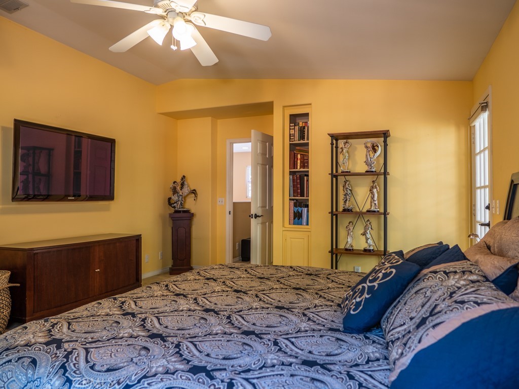 1934 Pasadena Glen Road Pasadena, CA 91107 - Photo 25 of 38 a bedroom with a bed and a flat screen tv