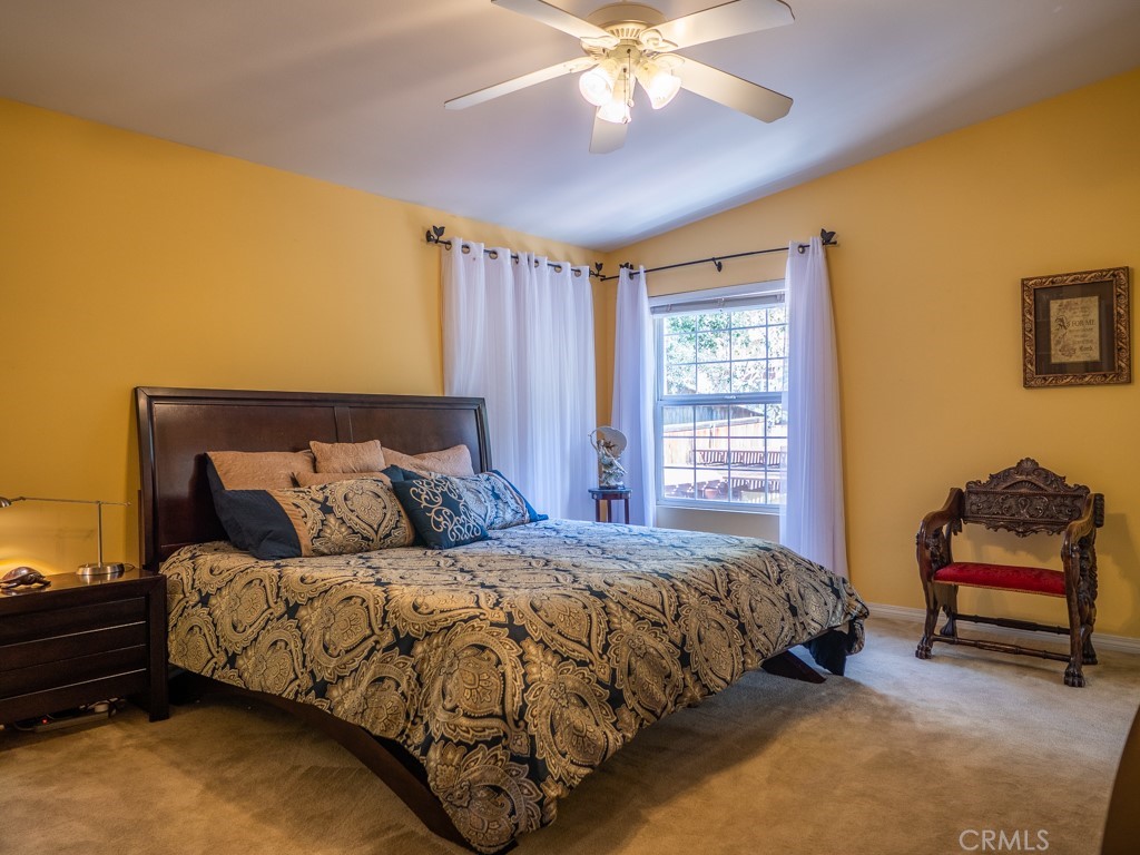 1934 Pasadena Glen Road Pasadena, CA 91107 - Photo 26 of 38 a bedroom with a bed and window