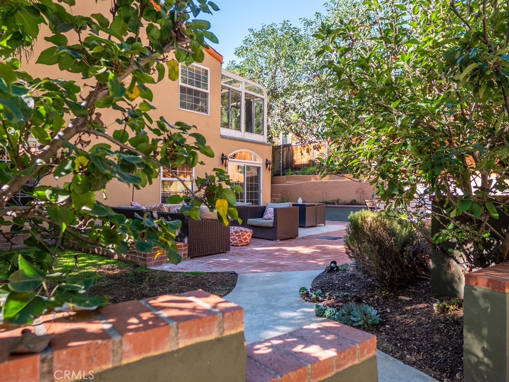 1934 Pasadena Glen Road Pasadena, CA 91107 - Photo 31 of 38 a front view of a house with garden