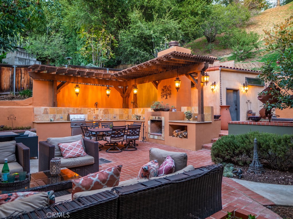 1934 Pasadena Glen Road Pasadena, CA 91107 - Photo 32 of 38 an outdoor space with seating area and swimming pool