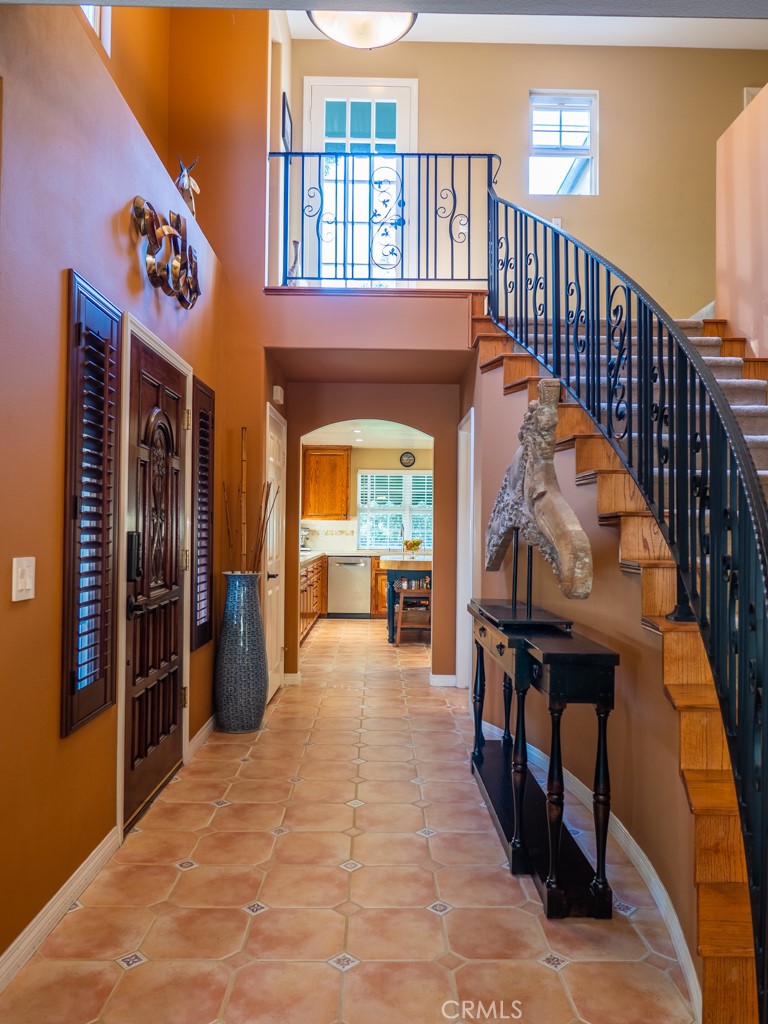 1934 Pasadena Glen Road Pasadena, CA 91107 - Photo 6 of 38 a view of front door with dining room and stairs