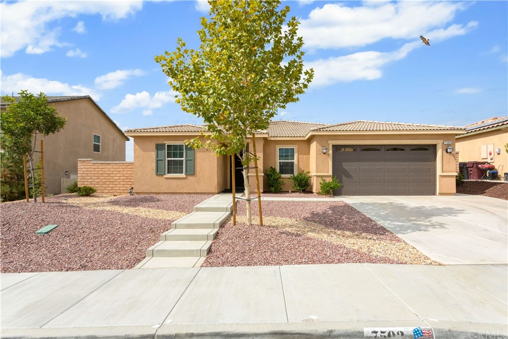 7503 Stockyard Road Riverside, CA 92507 - Photo 1 of 1 a house with a tree in front of it