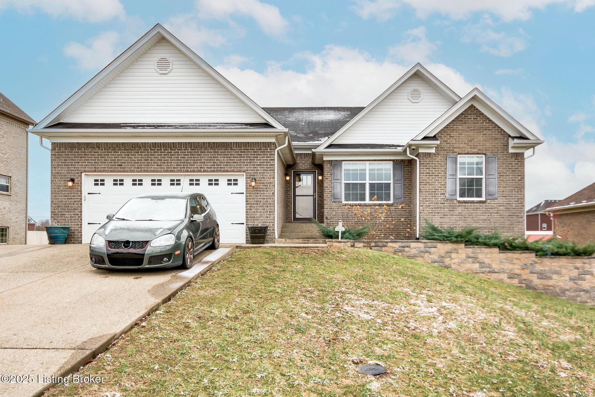 204 Autumn Ridge Drive Mount Washington, KY 40047 - Photo 1 of 61 Front view of this 4 Bedroom, 3 Full Bath all brick finished walk-out ranch home with a Great Room, Eat-In Kitchen w/Dining Area, Media Room, Family Room, Wet Bar, 1st Floor Laundry, Utility Room out the walkout, 2 Car Attached Garage w/a 3-car wide driveway, security system (door/window sensors, motion detectors & 2 external cameras), wired for a surround sound systems w/speakers & volume control knobs throughout, and many updates throughout!