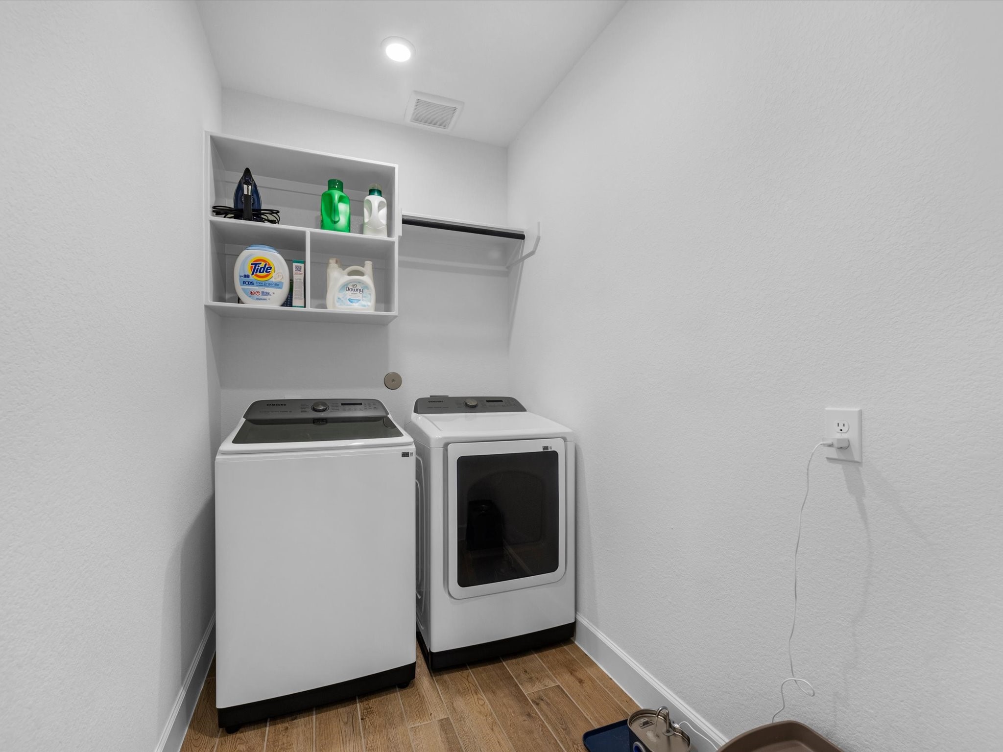 18714 Pistachio Way Manvel, TX 77578 - Photo 36 of 48 The oversized laundry room offers abundant workspace and storage, making everyday household tasks both practical and efficient.