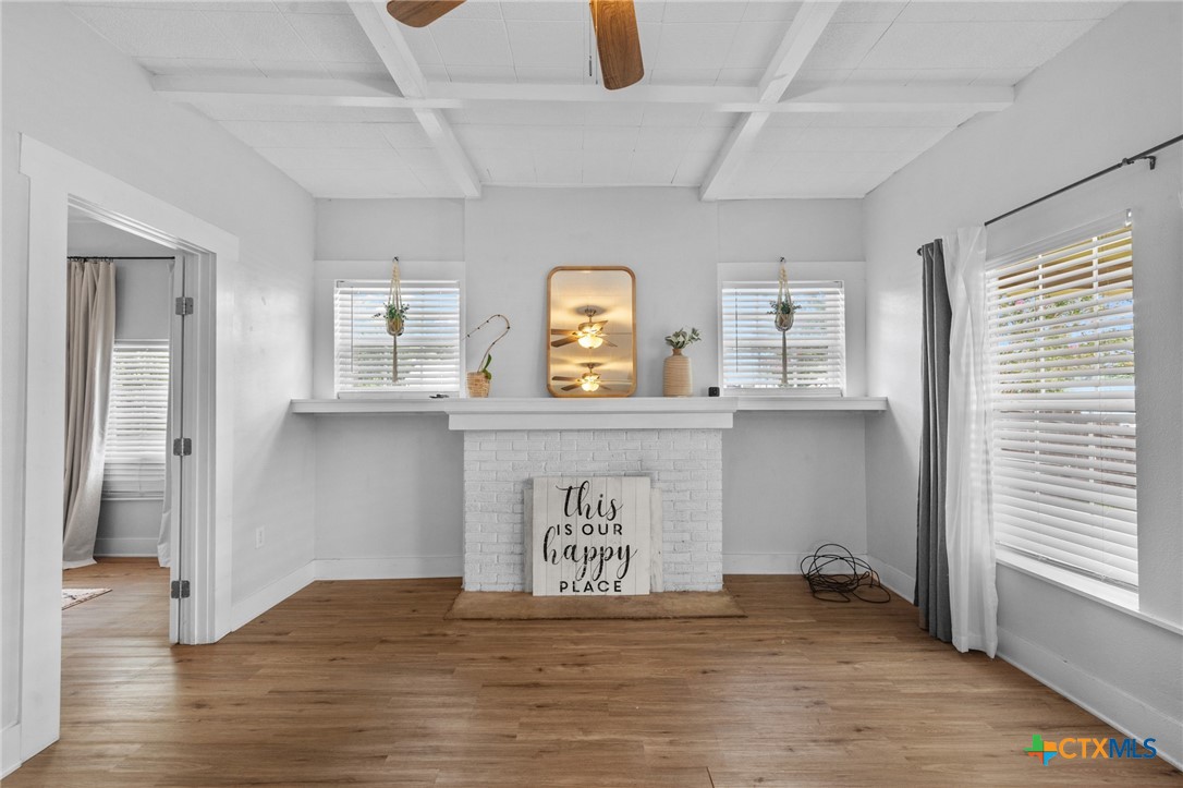 905 North Navarro Street Victoria, TX 77901 - Photo 7 of 28 a view of kitchen with furniture and window