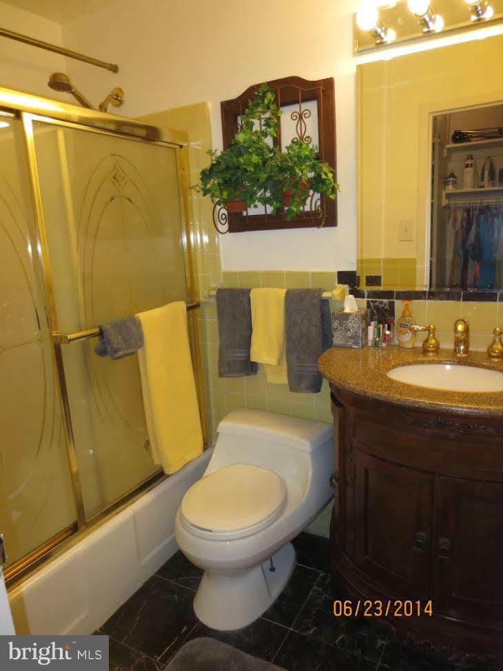 1011 Arlington Boulevard, Unit 627 Arlington, VA 22209 - Photo 15 of 28 REMODEL BATH WITH CUSTOM MARBLE FLOORS & ACCENTS