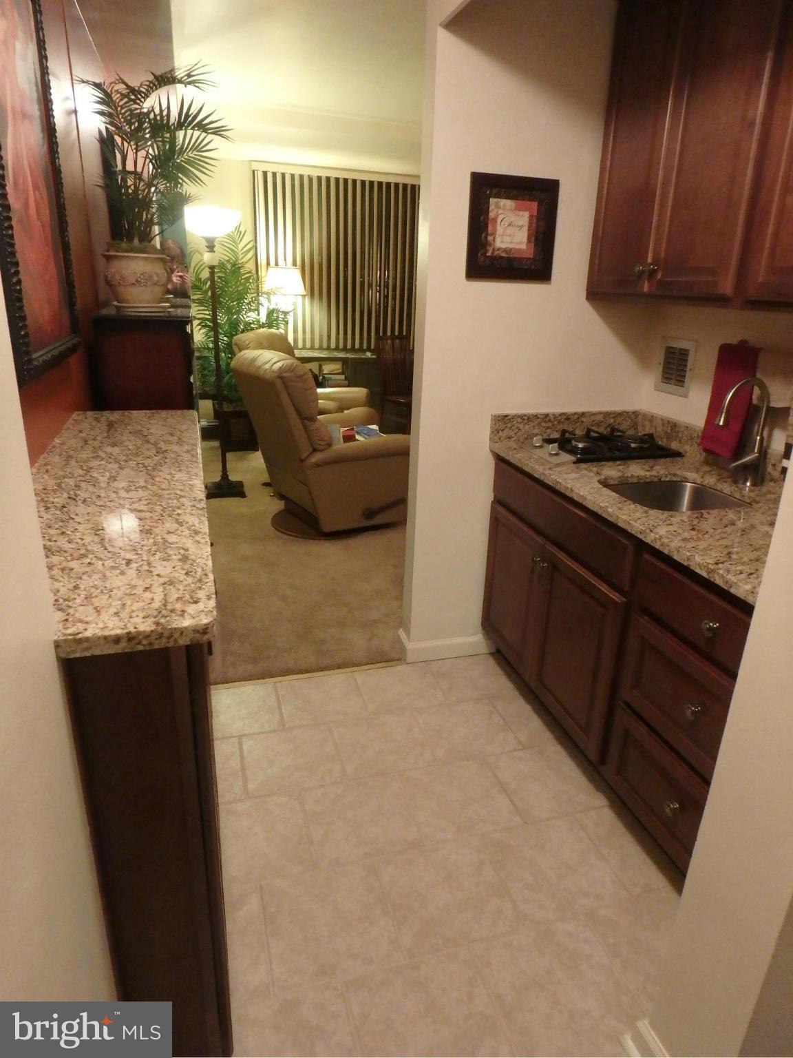 1011 Arlington Boulevard, Unit 627 Arlington, VA 22209 - Photo 9 of 28 KITCHEN AREA W/ CERAMIC TILE FLOORS