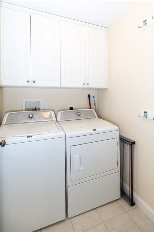 6 Essex Road, Unit 8 Ipswich, MA 01938 - Photo 21 of 35 a utility room with dryer and washer