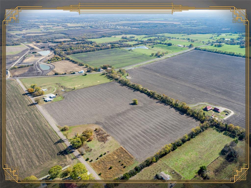 502 County Road 502 Blue Ridge, TX 75424 - Photo 1 of 1 a view of a backyard with wooden floor