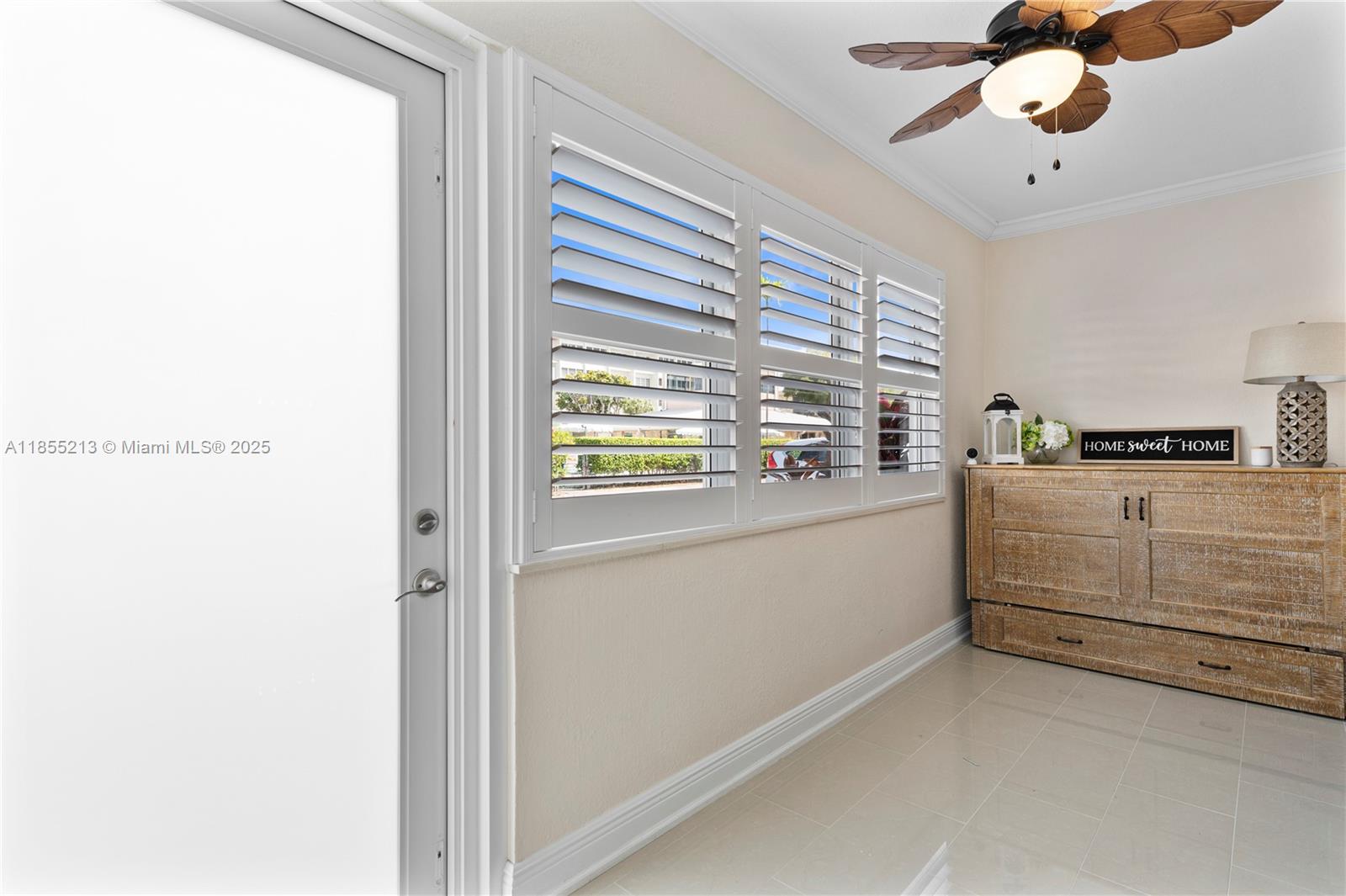 329 Southeast 3rd Street, Unit 105T Hallandale Beach, FL 33009 - Photo 17 of 25 a utility room with cabinets