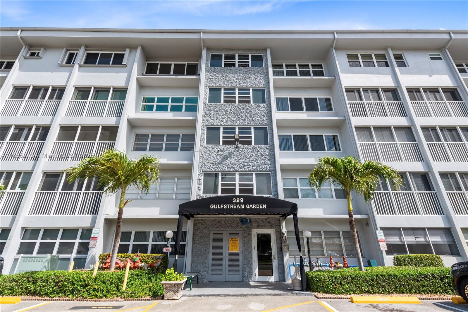 329 Southeast 3rd Street, Unit 105T Hallandale Beach, FL 33009 - Photo 24 of 25 a front view of a multi story building