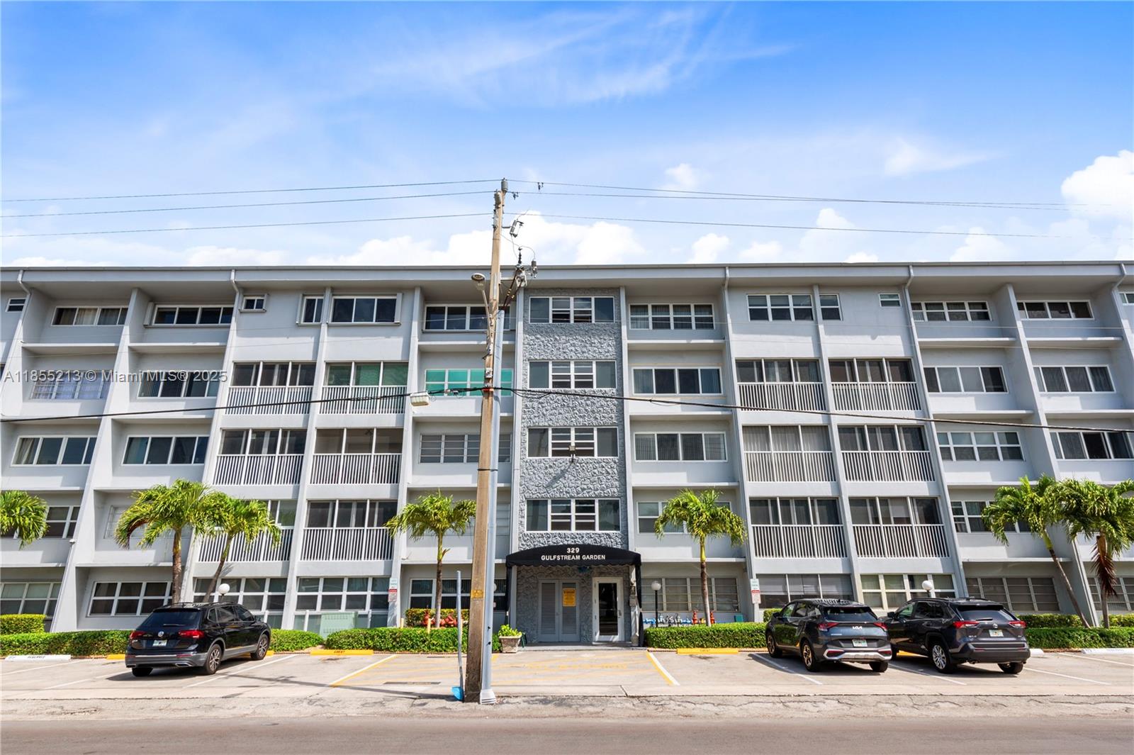 329 Southeast 3rd Street, Unit 105T Hallandale Beach, FL 33009 - Photo 25 of 25 a front view of a building with street