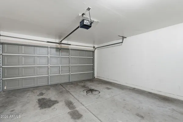 a view of an empty room with stairs