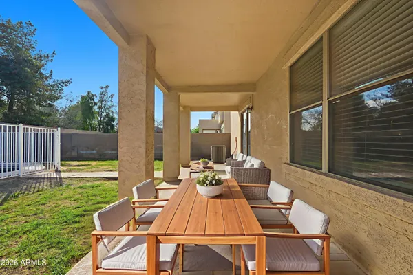 a bathroom with a glass shower door and a glass door