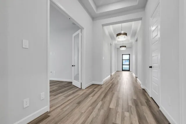 a view of a livingroom from a hallway