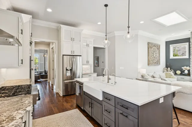 a bathroom with a sink vanity granite and a mirror