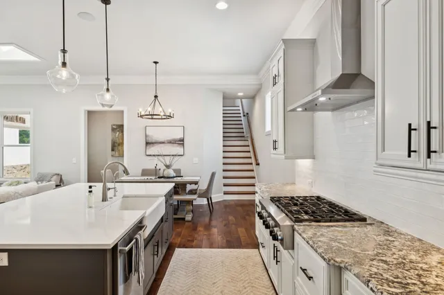 a bathroom with a shower and a glass door