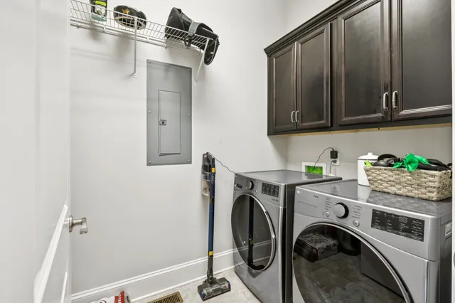 an aerial view of multiple houses with yard