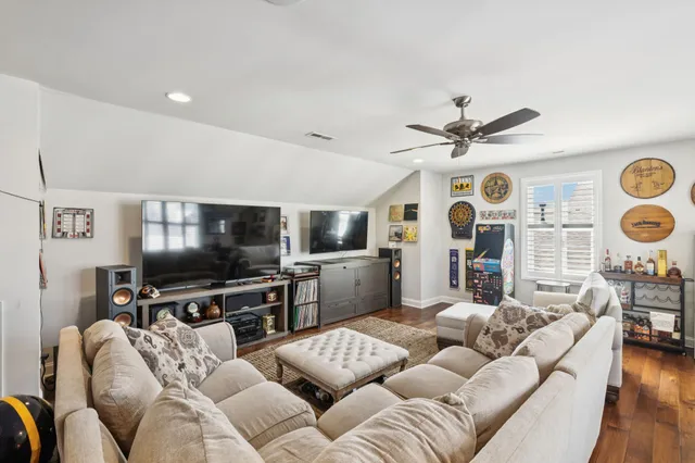 a view of a lake with houses in the back