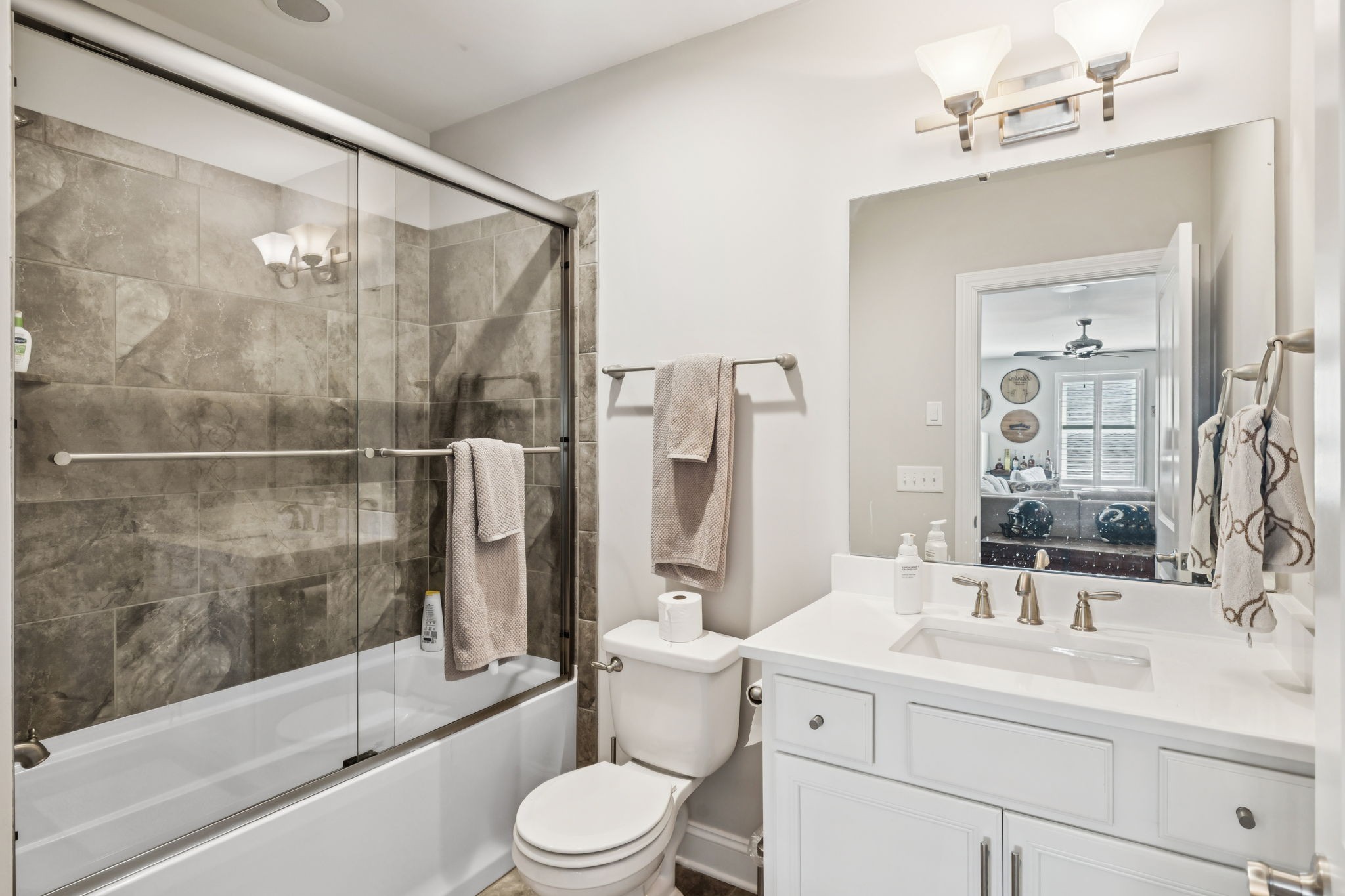 9080 Keats Street Franklin, TN 37064 - Photo 52 of 88 a bathroom with a sink a toilet and shower