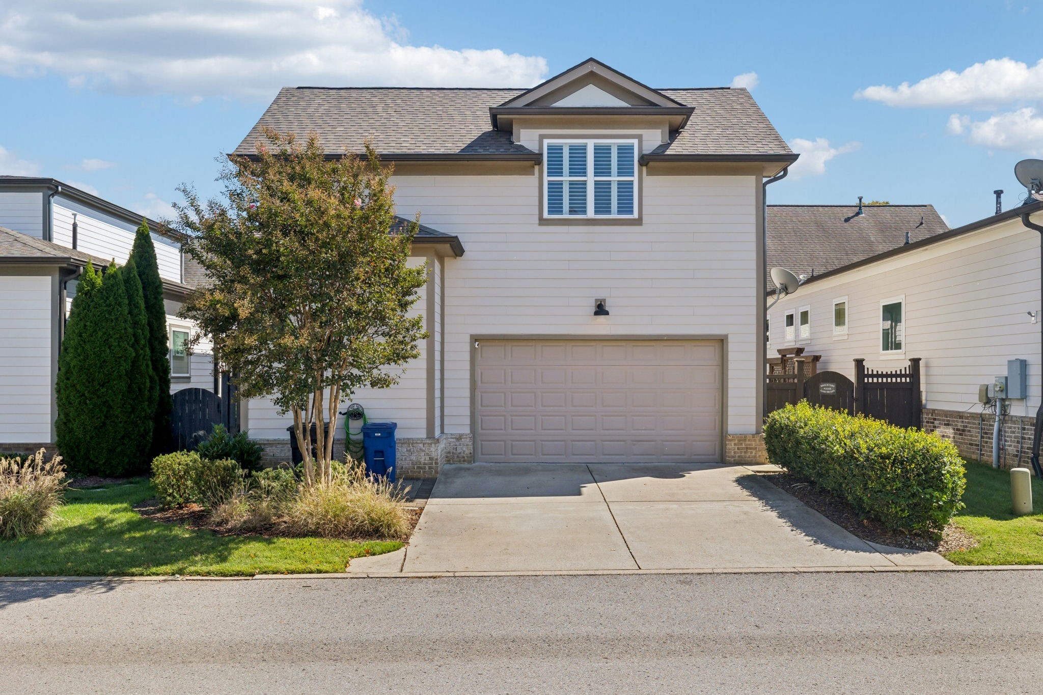 9080 Keats Street Franklin, TN 37064 - Photo 58 of 88 a front view of a house with a yard and garage