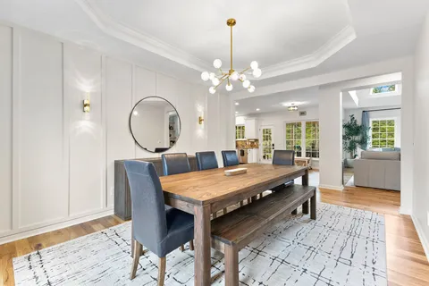 a bedroom with a bed and a table
