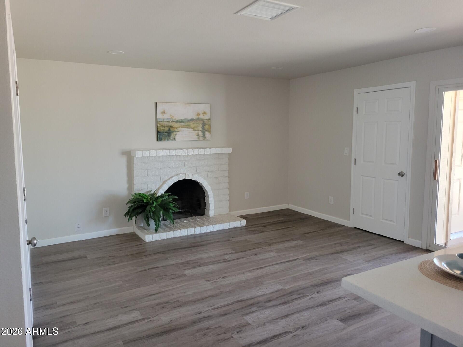 602 West Sesame Street Tempe, AZ 85283 - Photo 4 of 10 Fireplace and dining room