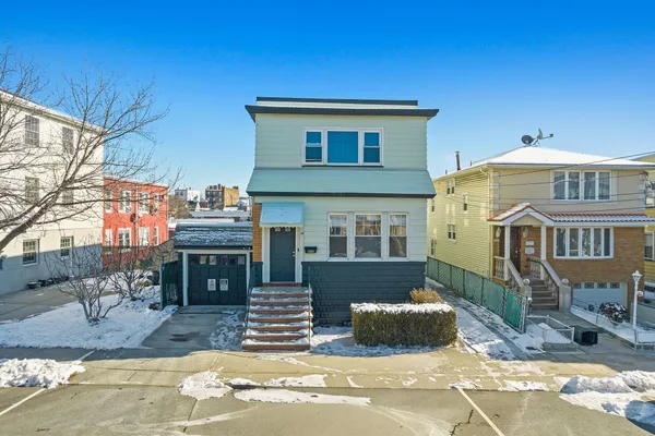 a bathroom with a shower and a sink