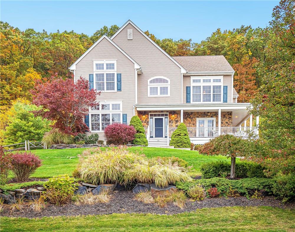 13 Heather Ridge Highland Mills, NY 10930 - Photo 1 of 1 a front view of a house with a yard