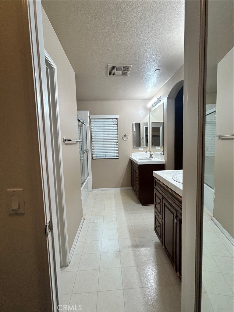 84 Hedge Bloom Irvine, CA 92618 - Photo 6 of 17 primary bathroom with dual sinks