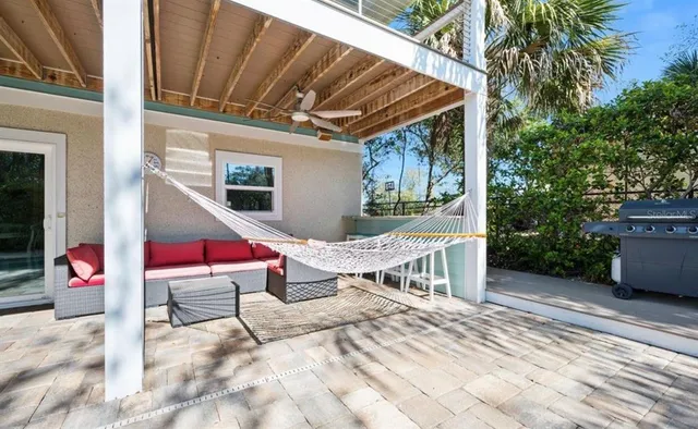 a backyard of a house with seating space