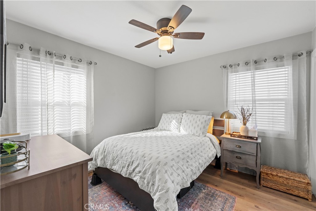 2117 West Corydon Street Compton, CA 90220 - Photo 11 of 40 a bedroom with a bed and a window