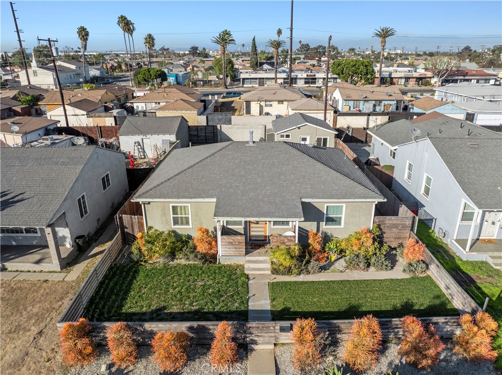 2117 West Corydon Street Compton, CA 90220 - Photo 2 of 40 an aerial view of a house with a yard basket ball court and outdoor seating