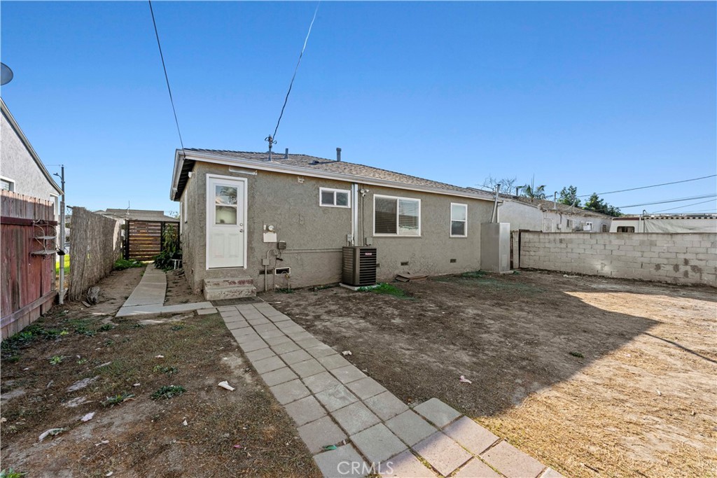 2117 West Corydon Street Compton, CA 90220 - Photo 34 of 40 a view of a house with backyard
