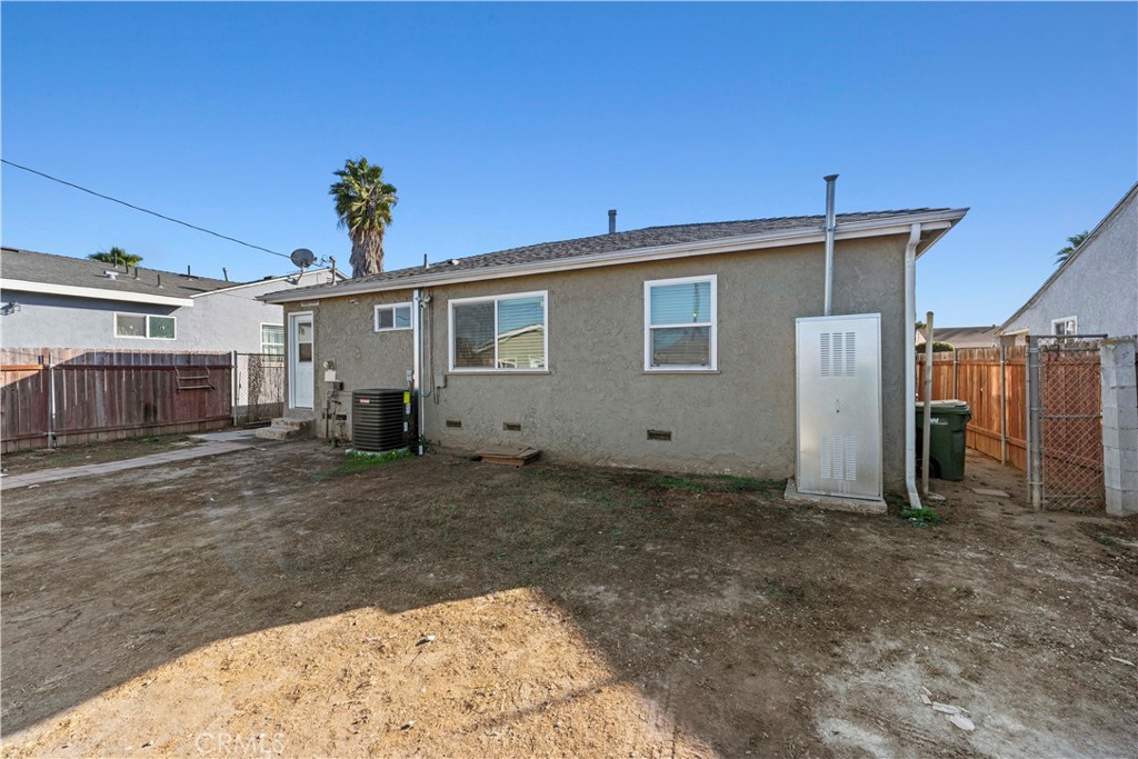 2117 West Corydon Street Compton, CA 90220 - Photo 35 of 40 a view of a house with a backyard