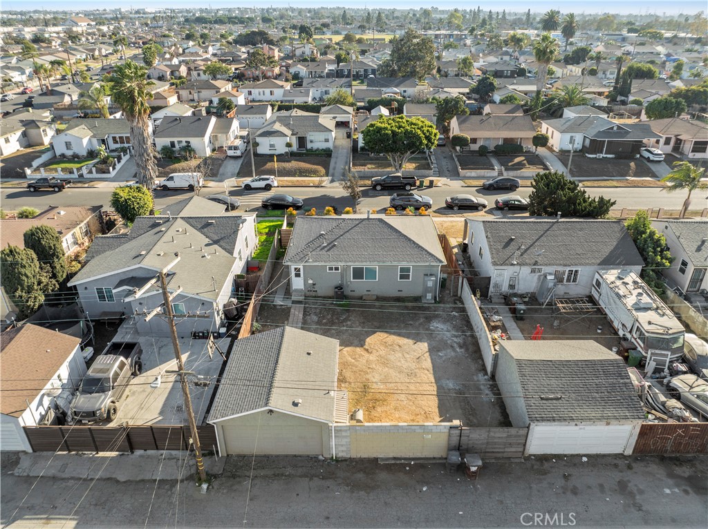 2117 West Corydon Street Compton, CA 90220 - Photo 38 of 40 an aerial view of residential houses with outdoor space