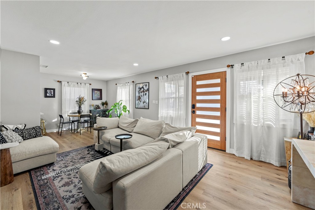 2117 West Corydon Street Compton, CA 90220 - Photo 4 of 40 a living room with furniture and a window