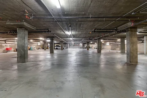 a view of a studio with wooden floor